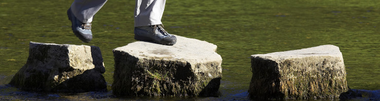 bigstock_Crossing_Three_Stepping_Stones_158564